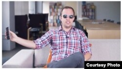 "Wired" magazine senior writer David Pierce tests the iPhone X's Face ID system with sunglasses during his evaluation of Apple's latest smartphone. (Wired)