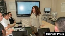 Souzy Guirguis teaches military students in Egyptian dialect at the Defense Language Institute Foreign Language Center (Courtesy - DLI).