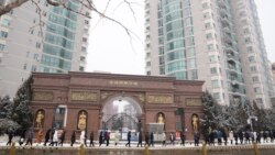 Workers from the restaurant industry line up for their covid tests in Beijing, China, Jan. 22, 2022. Chinese authorities have called on the public not to travel during the Lunar New Year.