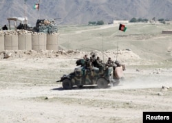Afghan special forces patrol in Pandola village near the site of a U.S. bombing in the Achin district of Nangarhar province in eastern Afghanistan April 14, 2017.