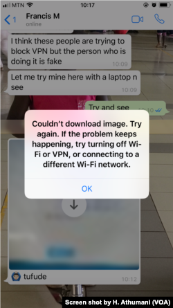 A message from a service provider is displayed on a phone after a customer was unable to download an image even after paying Uganda's new social media tax.