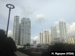 Property developers are building enclosed communities in Vietnam where sustainability is part of the design, from motion-detecting lights to pollution warning systems.