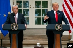 President Donald Trump and European Commission President Jean-Claude Juncker speak in the Rose Garden of the White House, July 25, 2018, in Washington.