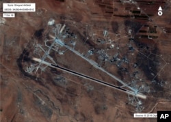 FILE - This Oct. 7, 2016, satellite image released by the U.S. Department of Defense shows the al-Shayrat air base in Syria. The U.S. blasted a Syrian air base with a barrage of cruise missiles on April 7, 2017.