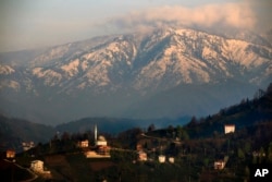 This April 3, 2017 photo, shows a view from the mountaintop village of Dumankaya in the rugged province of Rize on Turkey's Black Sea region.