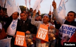 People attend a rally demanding the release of former President Alberto Fujimori in Lima, Peru, July 22, 2016.