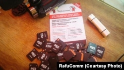 The information stored on the micro SD cards does not require internet connection. RefuComm's Sharon Silvey argues too many tech-based responses have been designed at a distance from the people they're supposed to help.