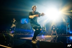 FILE - Justin Bieber performing at the BBC Radio 1 Teen Awards.