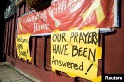 Celebratory signs are displayed outside Zaney's coffeeshop in Hailey, Idaho, May 31, 2014.
