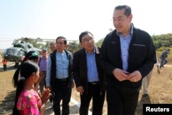 Surakiart Sathirathai, a former Thai foreign minister and chairman of the international advisory board on the crisis in Rakhine state, visits one of the camps set up by Myanmar's Social Welfare, Relief and Resettlement Minister for the repatriation of displaced Rohingyas, outside Maungdaw in the state of Rakhine, Myanmar, Jan. 24, 2018