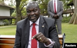 FILE - South Sudan's rebel leader Riek Machar speaks during an interview in Nairobi, Kenya, July 8, 2015.