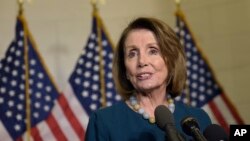 FILE - House Minority Leader Nancy Pelosi of California speaks to reporters on Capitol Hill in Washington, Nov. 30, 2016.