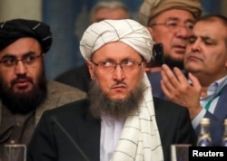 FILE - Deputy Head of Political Office of the Taliban Abdul Salam Hanafi attends a conference arranged by the Afghan diaspora in Moscow, Russia, Feb. 5, 2019.