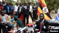 Ugandan musician-turned-politician Robert Kyagulanyi Ssentamu, also known as Bobi Wine, addresses a news conference at his home in Kampala, Uganda, Sept. 24, 2018.