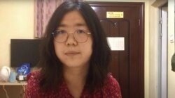 FILE - This file screengrab taken on Dec. 28, 2020 from an undated video showing former Chinese lawyer and citizen journalist Zhang Zhan as she broadcasts via YouTube, at an unconfirmed location in China. (AFP Photo / You Tube)