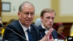 President of the Institute for Science and International Security David Albright, left, accompanied by Former State Department Director of Policy Planning Jake Sullivan speaks before the House Foreign Affairs Committee at Capitol Hill in Washington, Oct. 11, 2017.