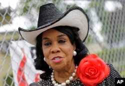 FILE - Rep. Frederica Wilson, D-Fla., talks to reporters in Miami Gardens, Fla., Oct. 18, 2017.