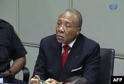 Former Liberian President Charles Taylor appearing in court at the Special Court for Sierra Leone in Leidschendam, Jan. 22, 2013.