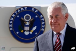 FILE - U.S. Secretary of State Rex Tillerson arrives at Djibouti–Ambouli International Airport in Djibouti, March 9, 2018.