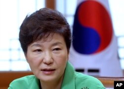 FILE - South Korean President Park Geun-hye speaks during a regular meeting at the presidential house in Seoul, South Korea.