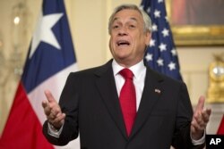 Chile's President Sebastian Pinera speaks during a appearance with Secretary of State John Kerry at the State Department in Washington, June 3, 2013.