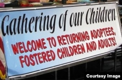 Photo shows banner at an annual pow wow organized by First Nations Repatriation Institute to welcome returning adoptees and fostered children back to the reservation. Courtesy: Sandy White Hawk.