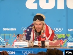 U.S. snowboarder Sage Kotsenburg addressing a news conference after winning the first gold medal at the Sochi Olympics, Feb. 8, 2014 (P. Brewer/VOA).