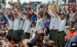 Boy Scouts sing and dance to music as they await the arrival of President Donald Trump at the 2017 National Boy Scout Jamboree at the Summit in Glen Jean, West Virginia, July 24, 2017.