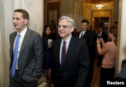 FILE - US. Supreme Court nominee Judge Merrick Garland walks after a breakfast with Senate Judiciary Committee Chair Senator Chuck Grassley (R-IA) on Capitol Hill Washington, April 12, 2016.