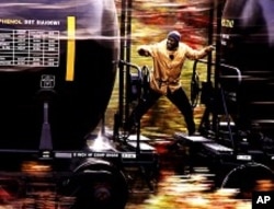 Denzel Washington as train engineer Frank Barnes races to stop an unmanned runaway train - effectively a missile the size of a skyscraper - and prevent disaster in a heavily populated area in Unstoppable.