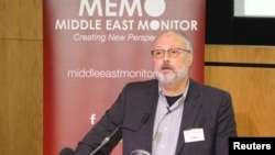 FILE - Saudi dissident Jamal Khashoggi speaks at an event hosted by Middle East Monitor in London, Sept. 29, 2018.