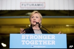 Democratic presidential candidate Hillary Clinton gives a speech on the economy after touring Futuramic Tool & Engineering, in Warren, Mich., Aug. 11, 2016.
