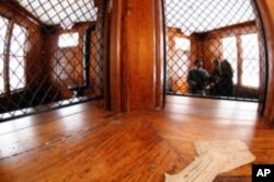 The station's ticket agent sat in a room that faced both black and white waiting areas. Patrons could see into each room, but African-American patrons could not venture beyond their own area.