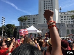 Demonstrators gather for “A Day Without a Woman,” an event coinciding with International Women’s Day, in Los Angeles, March 8, 2017. (E. Lee/VOA)