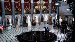 President Joe Biden speaks from Statuary Hall at the U.S. Capitol to mark the one year anniversary of the Jan. 6 riot at the Capitol by supporters loyal to then-President Donald Trump, Thursday, Jan. 6, 2022, in Washington.