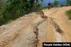 A dirt road above Majigaon in Sindhupolchak district was cracked by the magnitude-7.8 earthquake.