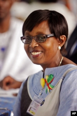 FILE - Doctor Matshidiso Moeti attending a World Health Organization meeting in Cotonou, Benin, Nov. 5, 2014.