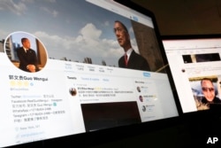 A Twitter page of Chinese exiles businessman Guo Wengui is seen on a computer screen in Beijing. Escalating efforts to repatriate one of its most wanted exiles, China’s ruling Communist Party has opened a police investigation on a new allegation, rape, against Guo.
