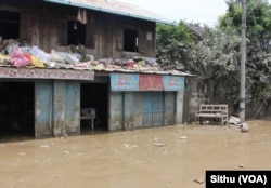 A building was damaged in the flooding in Magway, near Mandalay, Myanmar, Aug. 5, 2015. (Sithu/VOA)
