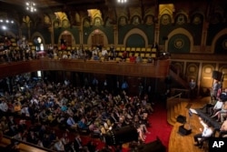 House Speaker Paul Ryan of Wisconsin, bottom right, responds to a question from the audience during a town hall at Gaston Hall at Georgetown University in Washington, April 27, 2016.