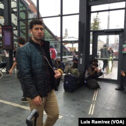 Hundreds of migrants continue to arrive in Sweden, most of them at the port city of Malmo, Sept. 22, 2015.