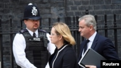 Britain's Home Secretary Amber Rudd arrives in Downing Street for an emergency Cabinet meeting in London, May 23, 2017.