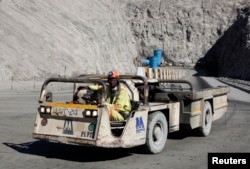FILE - A worker drives a vehicle at Zimplats' Ngwarati Mine in Mhondoro-Ngezi May 30, 2014. Leaked documents allege Zimplats used an offshore company to pay management salaries without the knowledge of the Reserve Bank of Zimbabwe.