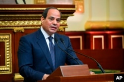 Egyptian President Abdel-Fattah el-Sissi addresses Parliament after being sworn in for a second four-year term, in Cairo, Egypt, in this June 2, 2018, photo provided by the media office of Egypt's presidency.