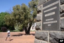 A campus plaque honoring the former president of the Free State Boer Republic Marthinus Theunis. Masitha says it's time for South Africans of all races to be honored by the university