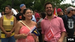 People celebrate Supreme Court ruling on Same Sex Marriage in front of the Supreme Court in Washington, D.C., June 26, 2015. (Photo: M. Burke / VOA)
