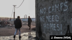 Though many have moved to an official camp opened in response to the situation in the barracks, others stay - some out of fear of the camps becoming detention centres, and others to keep in better contact with smugglers.