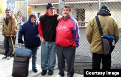 Homeless people outside St. Francis Inn, in the Kensington section of Philadlephia.