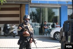 Iraqi Special Forces, Federal Police, Iraqi Army and Popular Mobilization Units were seen patrolling Kirkuk the day after they took the city on Oct. 17, 2017 in Kirkuk, Iraq. (H.Murdock/VOA)