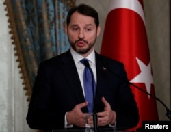 FILE - Turkish Treasury and Finance Minister Berat Albayrak speaks during a press conference in Istanbul, Turkey, Feb. 28, 2019.